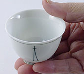 Patterned white porcelain cup, D6.2cm x H4.5cm / D2.4in x H1.8in