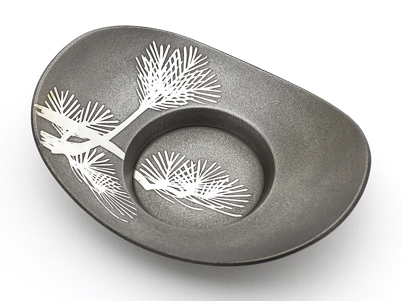 Oval tin saucer