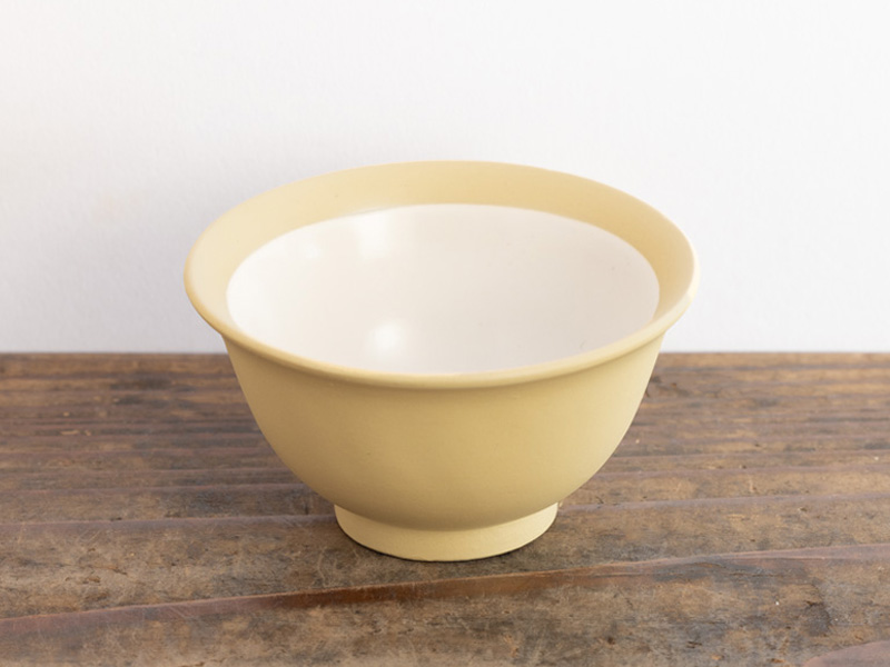 Beige cup with a white background, 50 ml